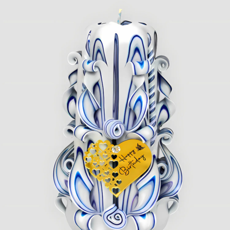 geschnitzte Kerze in blau-weiß, mit kunstvollen Windungen